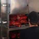 A grip of lobster being steamed at the local fish market.